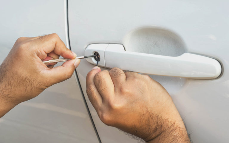 car door unlocking with lock pick automotive locksmith in mount pleasant, ma.